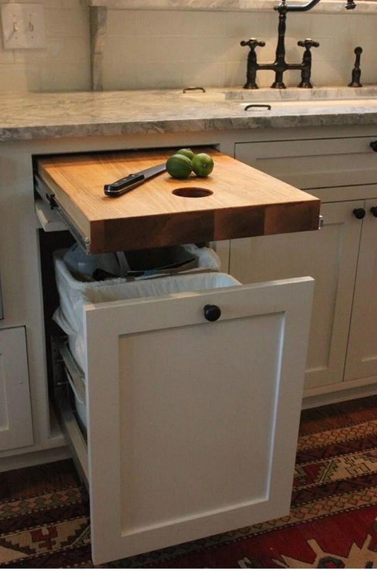 12 Kitchen Makeovers on a Budget That’ll Leave You Speechless! - Functional Elegance: Pull-out Cutting Boards
